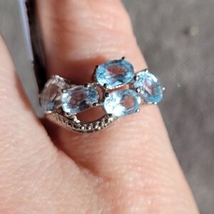 Silver 925 and blue topaz ring NWT size 7
